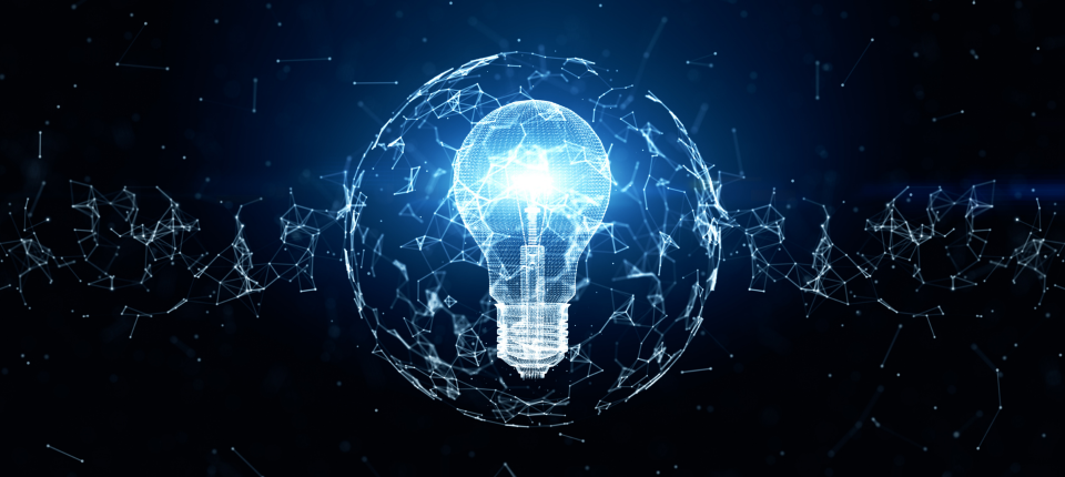 Digital illustration of a glowing light bulb made of connected lines and dots surrounded by a circular network pattern on a dark background representing ideas and innovation